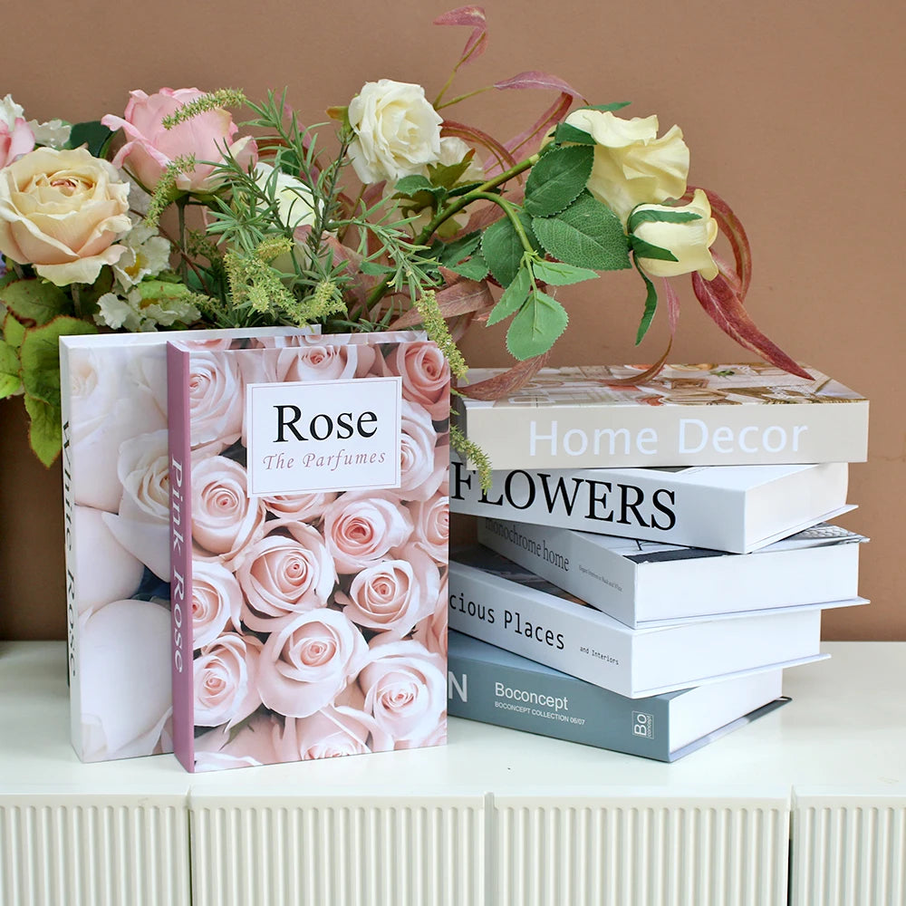 Bouquet of flowers with a box labeled 'Rose' and books on home decor and flowers.