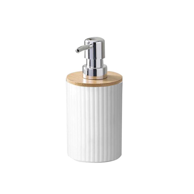 White soap dispenser with wooden top and silver pump on a white background