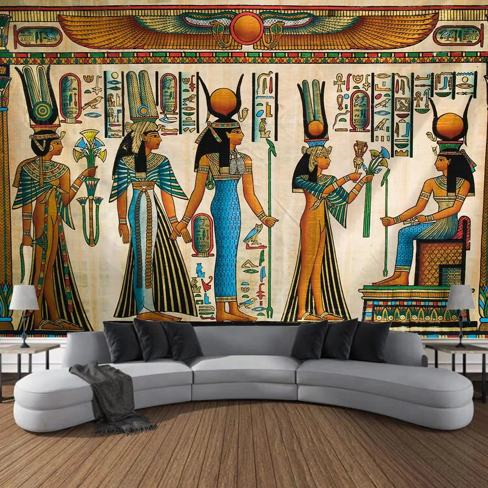 Living room with Egyptian-themed wall mural featuring deities and hieroglyphs.