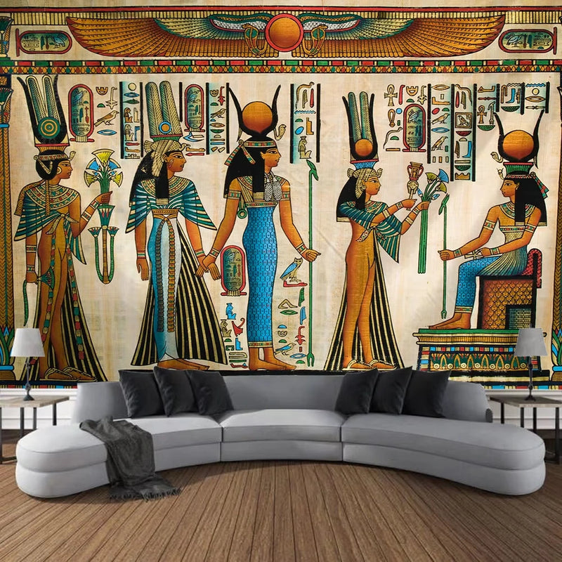 Living room with Egyptian-themed wall mural featuring deities and hieroglyphs.