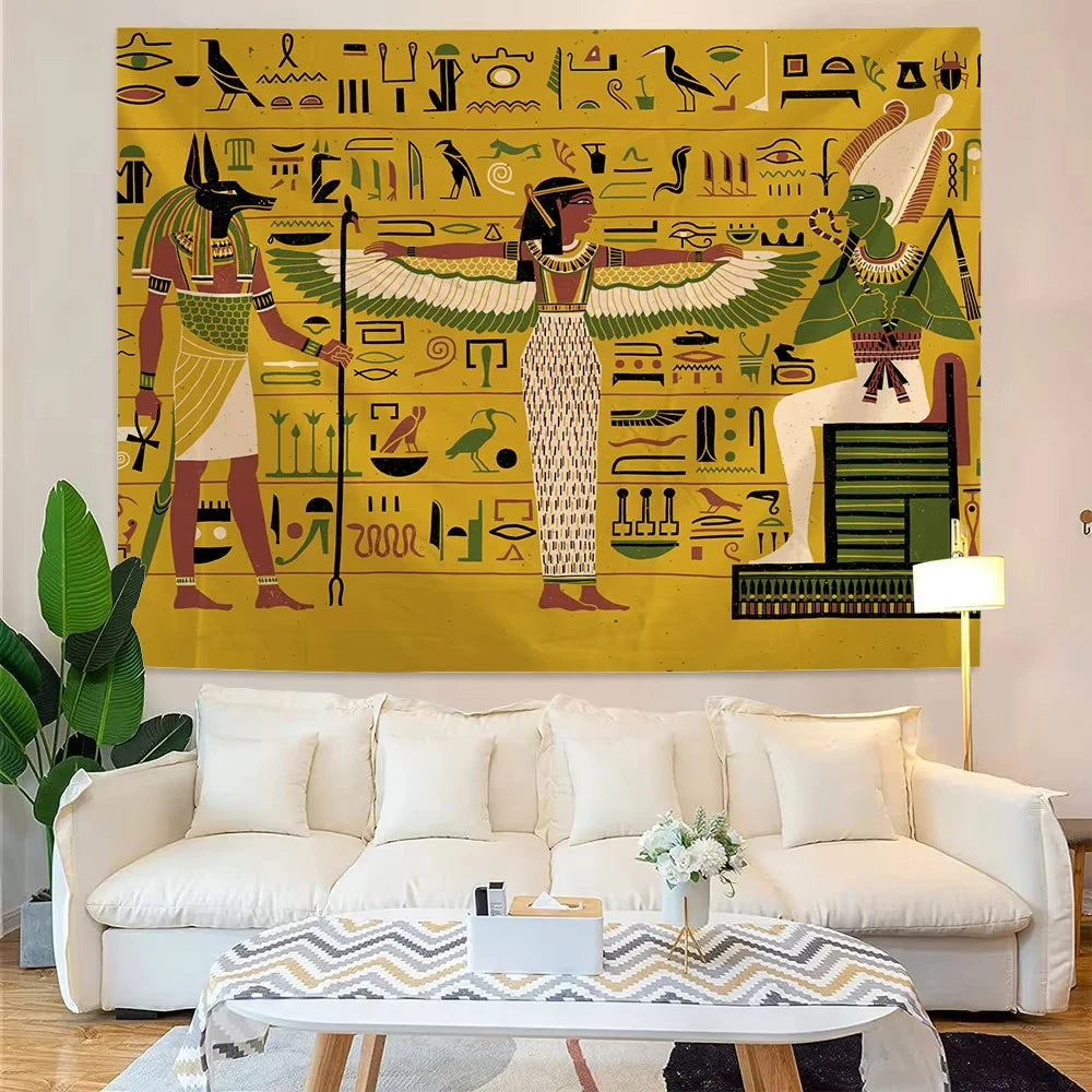 Living room with a large Egyptian-themed wall mural above a white sofa.