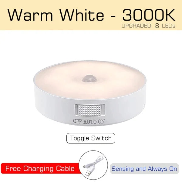 Round LED light with charging cable on a beige background
