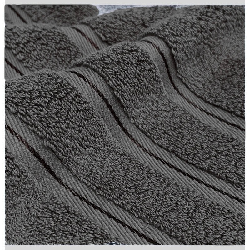 Close-up of a textured gray rug with a ribbed pattern