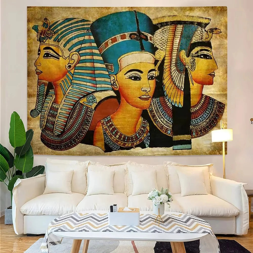 Living room with a large wall art depicting Egyptian pharaohs above a white sofa.
