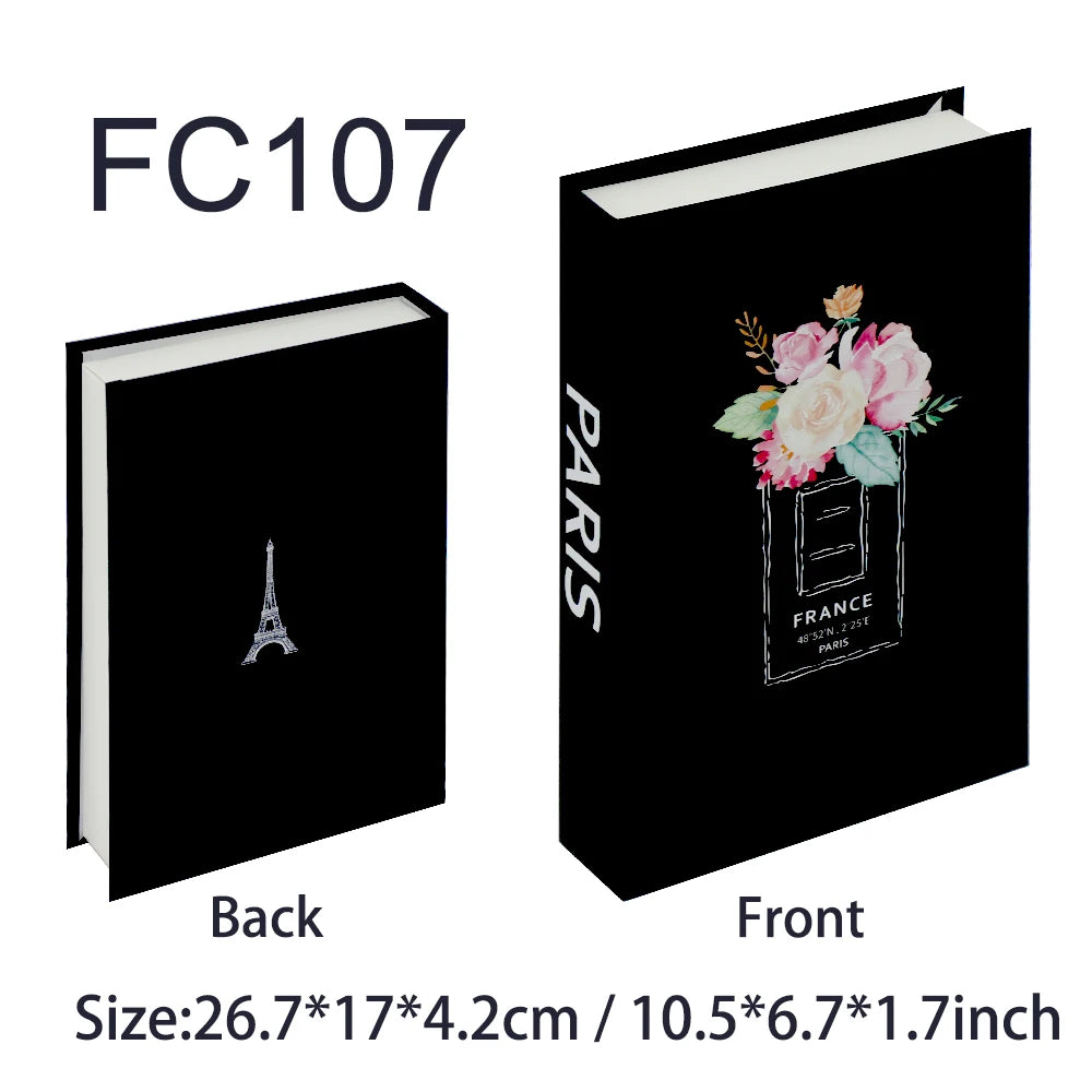 Black notebook with floral design on one side and Eiffel Tower on the other, labeled FC107.