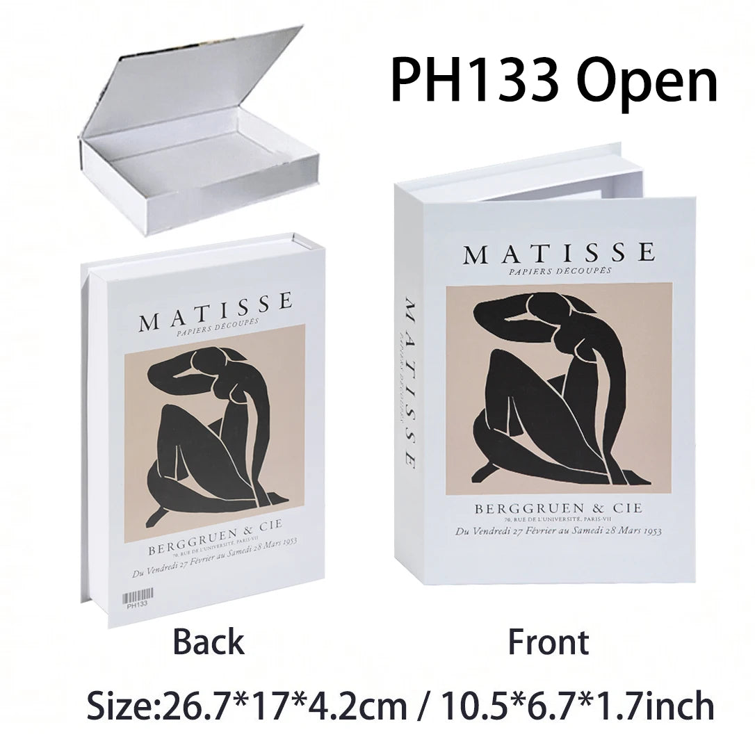 Matisse art book with open cover showing a black silhouette of a woman, on a white background.