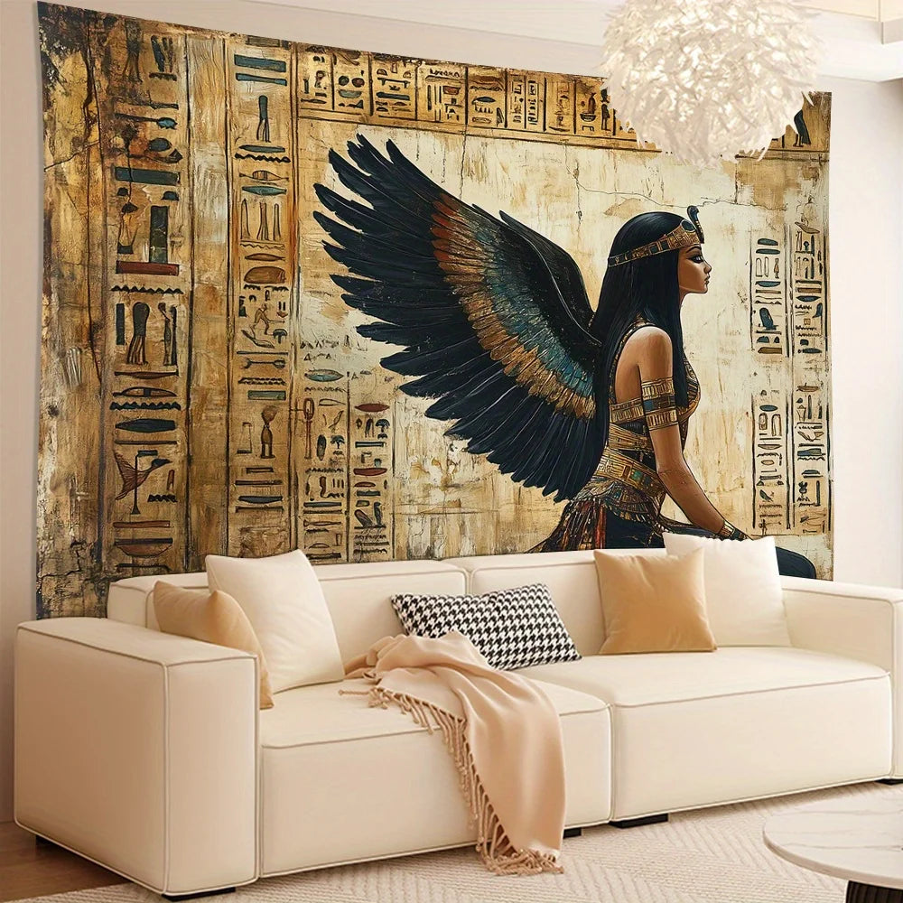 Decorative tapestry with an Egyptian-themed design of a woman with wings in a living room.