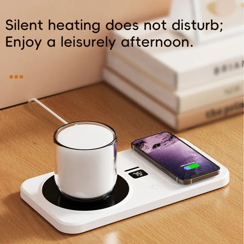 White mug on a heating pad with a smartphone next to it, placed on a wooden surface.