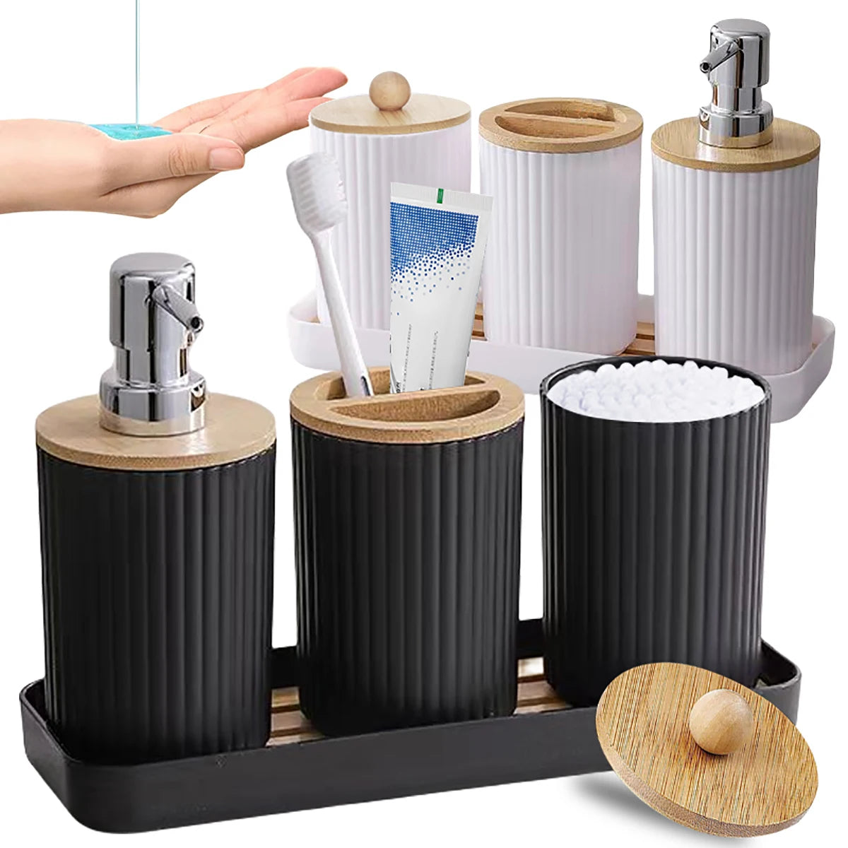 Bathroom accessory set with black and white containers on a wooden tray.