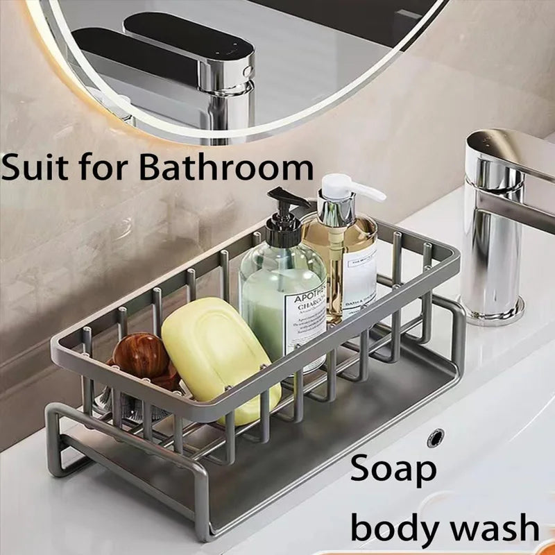 Bathroom sink with a gray caddy holding soap, body wash, and other toiletries.